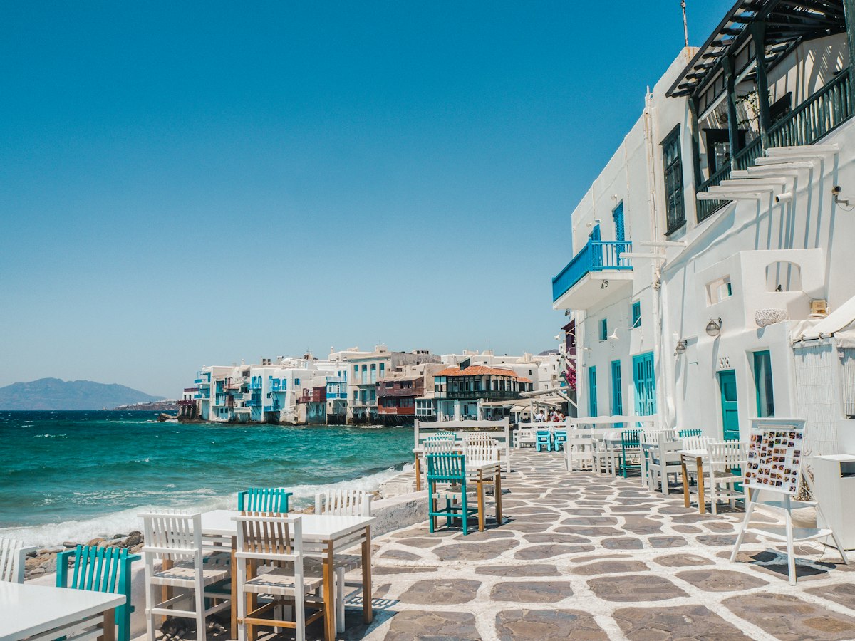 Whitewashed houses by the sea in the Cyclades, Greece