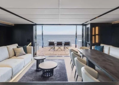 Sunreef 70 AGATA BLU salon opening onto the aft deck